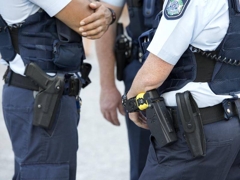Police are responding to what is believed to be an armed man holed up in home in Townsville.