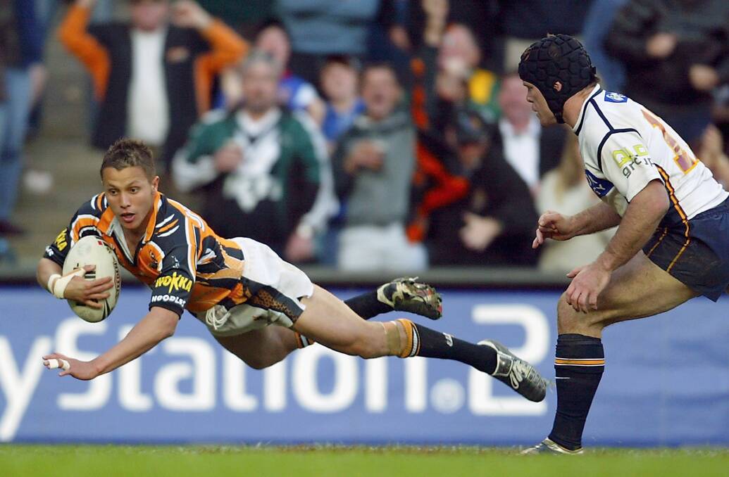 Scott Prince scores in the semi-final against the Brisbane Broncos in 2005. It was a good year. Picture: Getty Images
