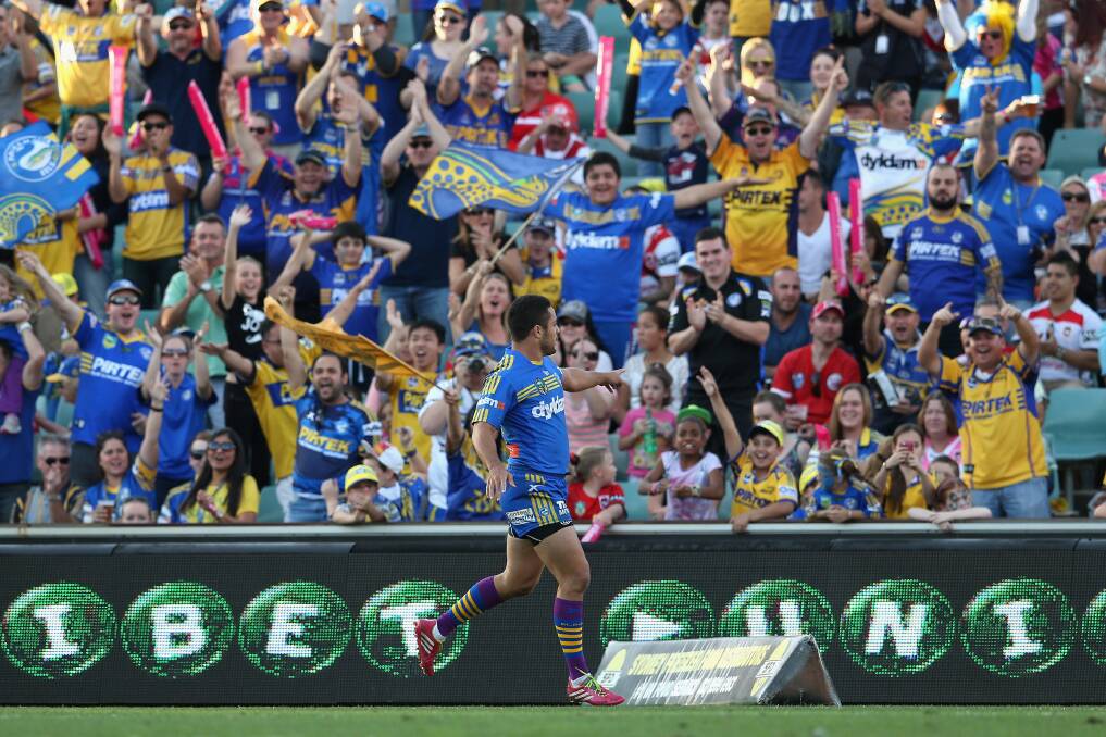 Take-off: Jarryd Hayne celebrates after his first try in Parramatta's 36-0 win against St George Illawarra. Picture: Getty Images