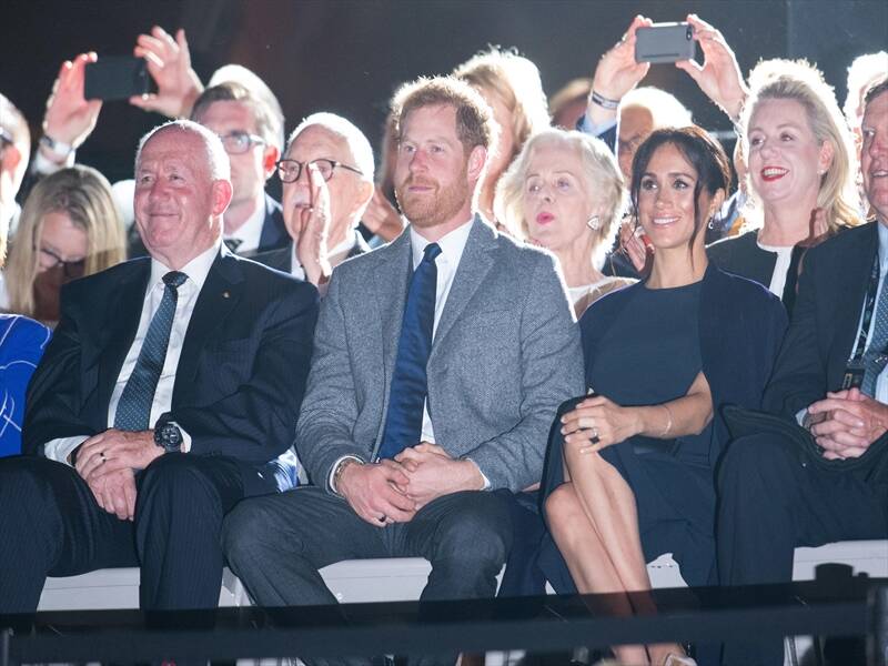 A soggy opening to the Invictus Games has failed to dampen Harry and Meghan's enthusiasm.