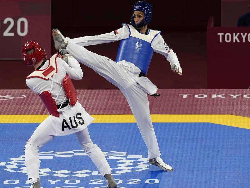 Australia's Jack Marton (l) was beaten 11-1 by Egypt's Seif Eissa in Olympic Taekwondo.