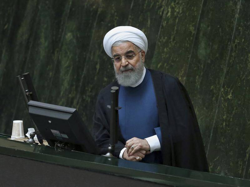 President Hassan Rouhani says Iran's military forces pose no threat to its neighbours.