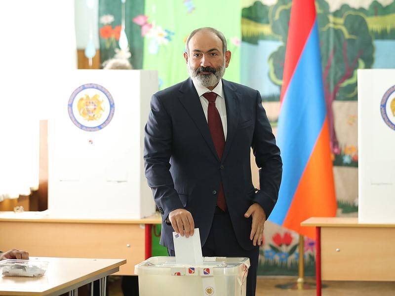 Armenia's acting Prime Minister Nikol Pashinyan casts his ballot at a polling station in Yerevan.