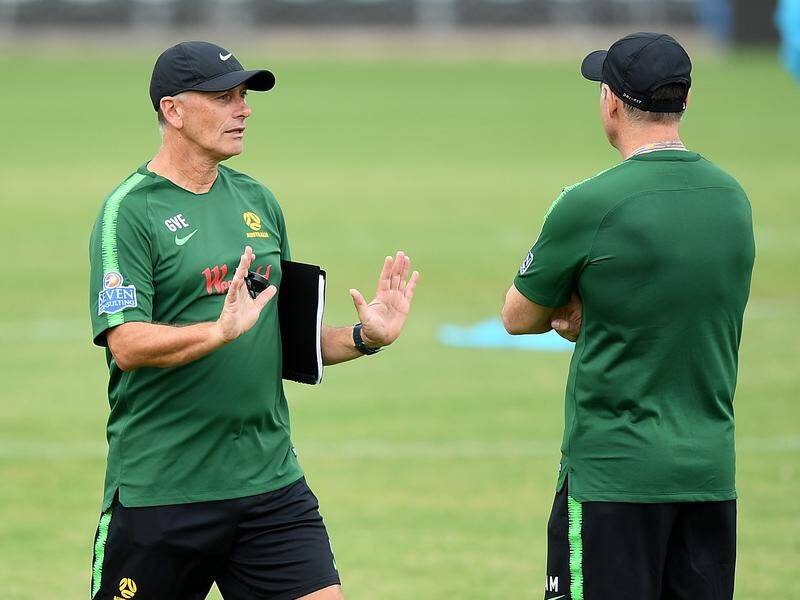 Gary van Egmond (l) is the new Young Socceroos coach after assisting Ante Milicic with the Matildas.