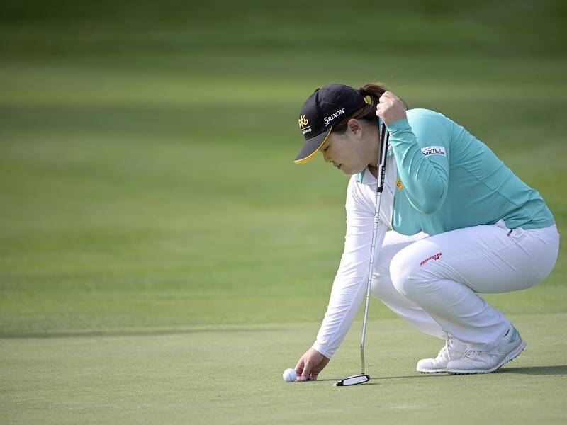 Inbee Park sets up for a putt during the second round of the LPGA tournament in Orlando, Florida.