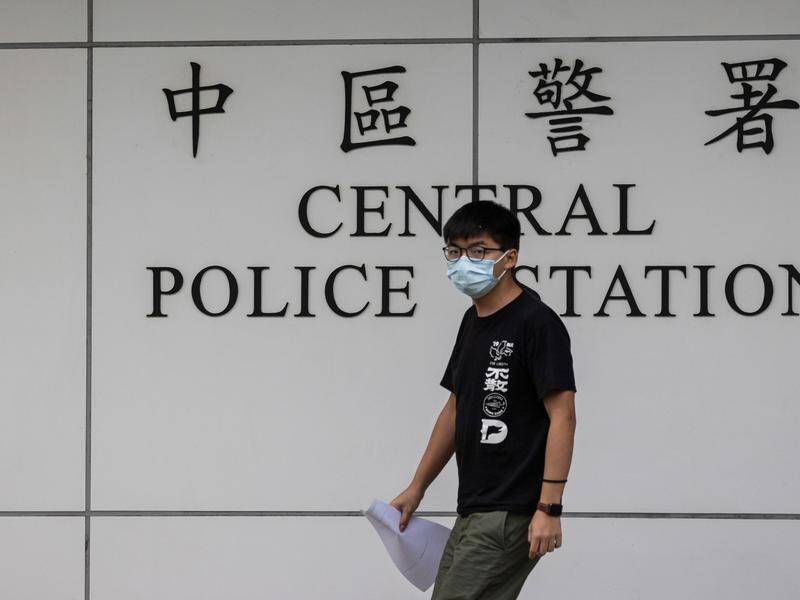 Hong Kong activist Joshua Wong left the Central Police Station after being released on bail.