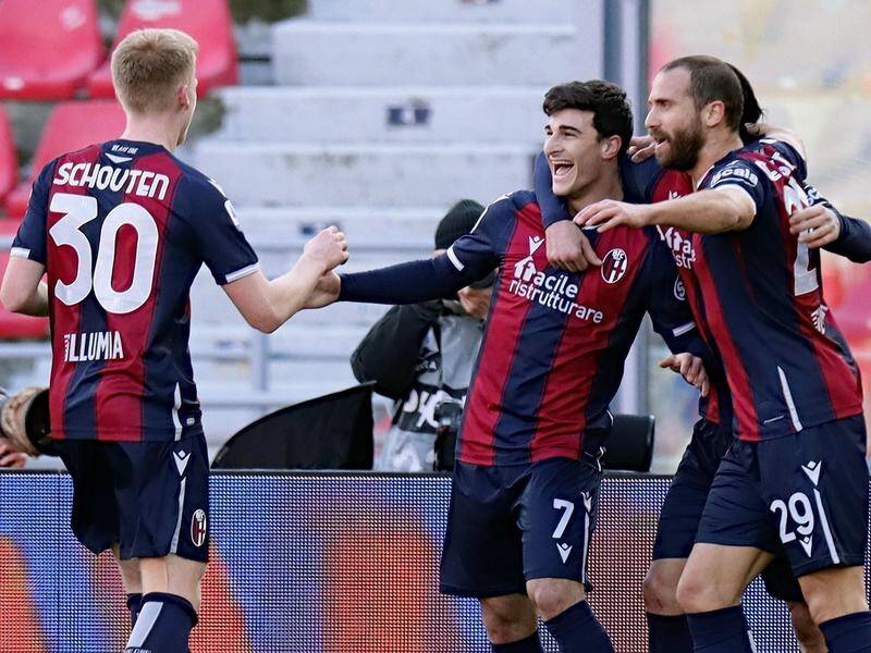 Bologna's Riccardo Orsolini (No.7) celebrated with teammates after his winning goal against Verona.