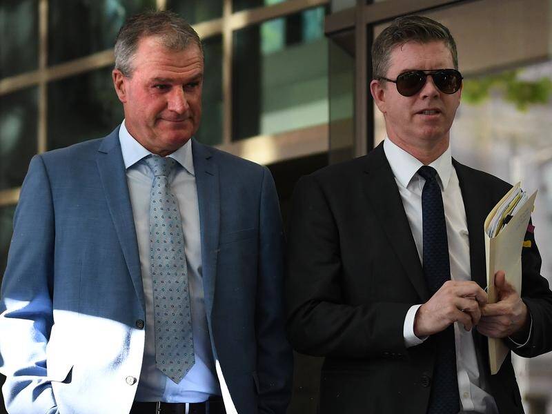 Suspended trainer Darren Weir (left) has faced court over animal cruelty charges.