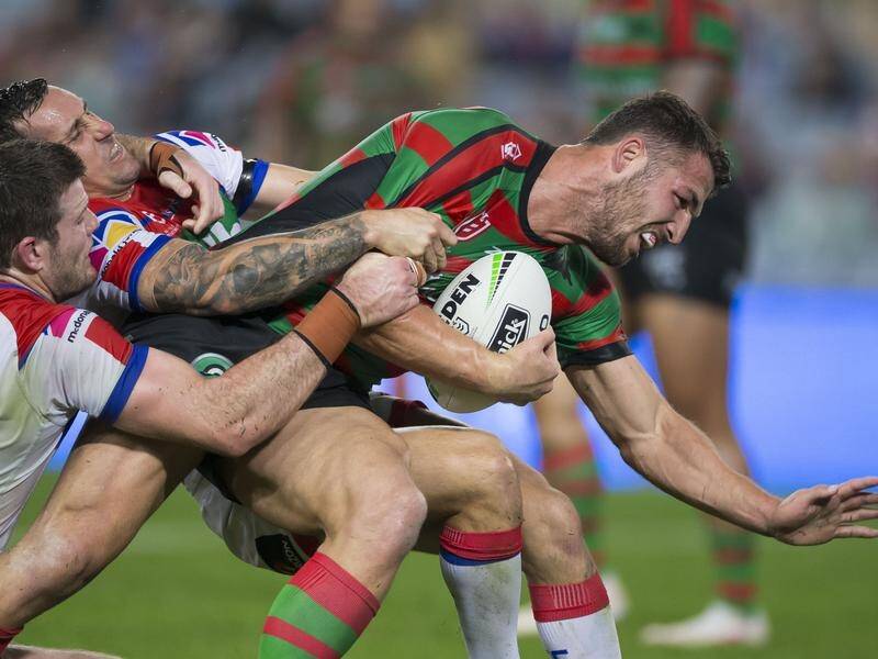 Sam Burgess has experienced complications after shoulder surgery, delaying his NRL return.