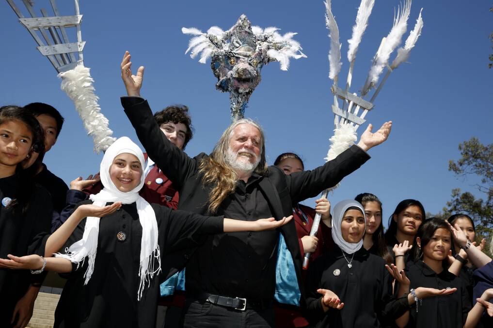 13.11.15 Peace Prize winner George Gittoes and students from Cabramatta High release doves in celebration of Peace Day. Picture: Anna Warr