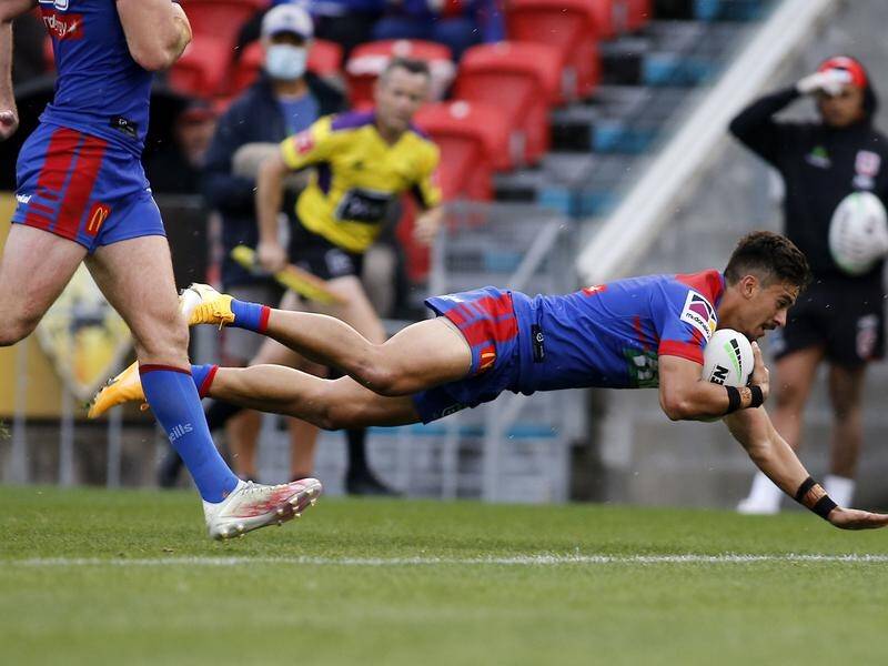 Enari Tuala scores one of two tries for the Knights in their 42-18 NRL win over the Dragons.