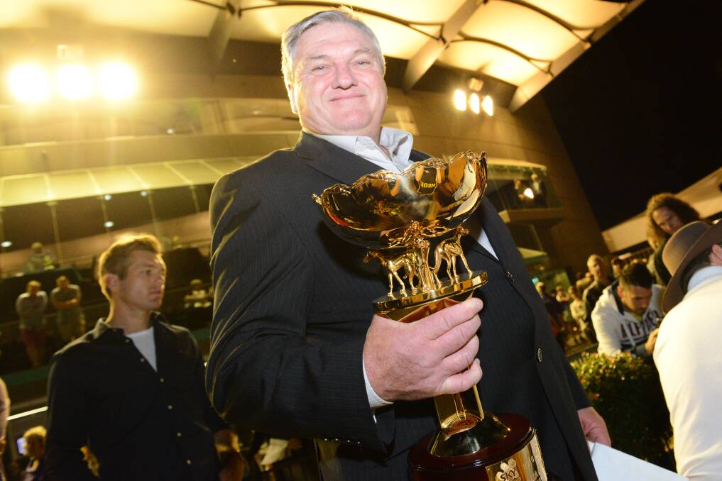CUP WINNER: The greyhound racing industry is mourning the loss of Paul Wheeler. Photo: Clint Anderson. 