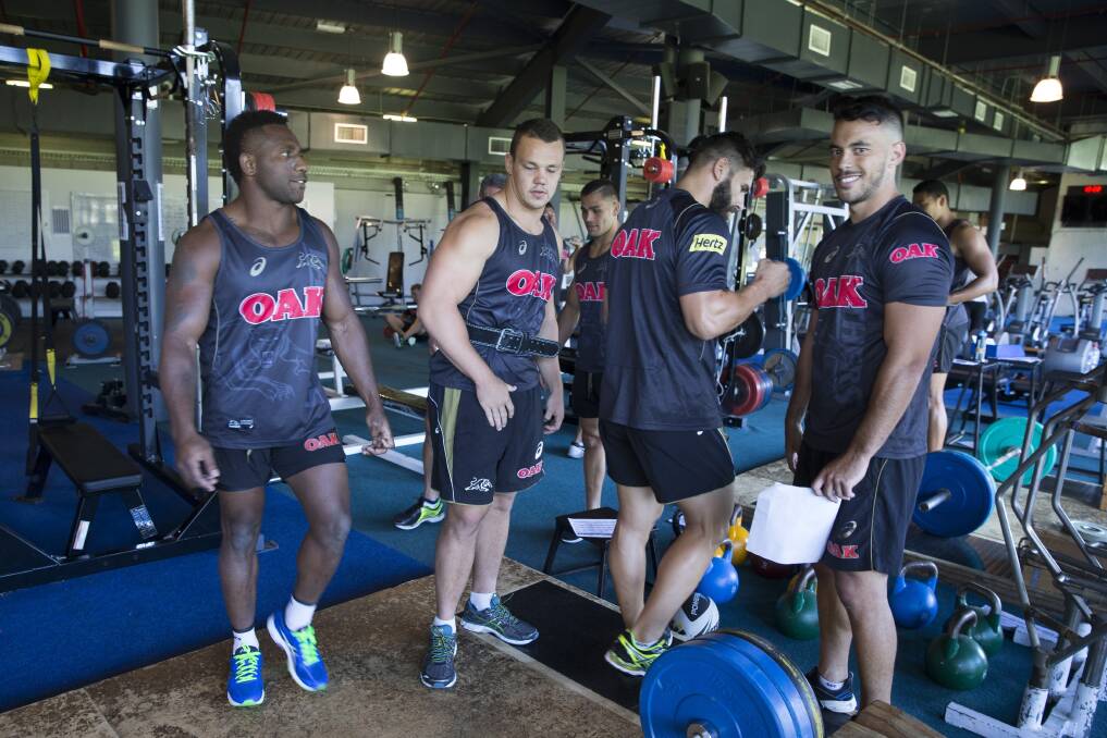 Mates: Isaac John (right) during a weights session with team mates James Segeyaro, Sam Anderson and Josh Mansour earlier this year. Picture: Geoff Jones 