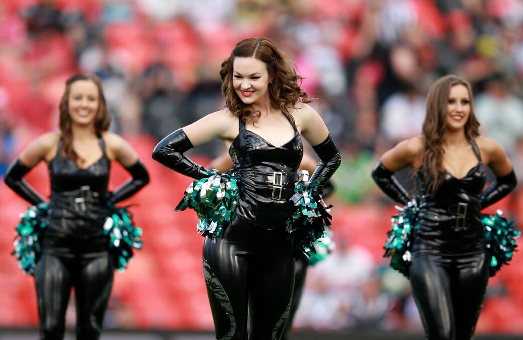 SYDNEY, AUSTRALIA - APRIL 05: Panthers cheer leaders perform before the round five NRL match between the Penrith Panthers and Canberra Raiders at Sportingbet Stadium on April 5, 2014 in Sydney, Australia. (Photo by Matt Blyth/Getty Images)