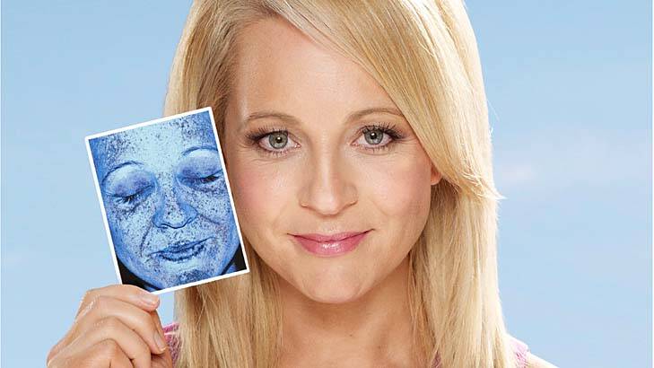 Shocked ... Carrie Bickmore holding her UV screen image.